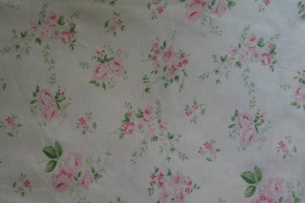 istock White fabric with floral print from above 899705174
