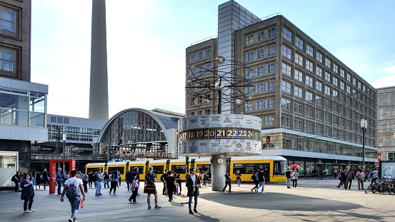 Berlin, Germany - Mai 22, 2017: Berlin Alexanderplatz on a summer afternoon in central Berlin near the railroad station and the TV tower.