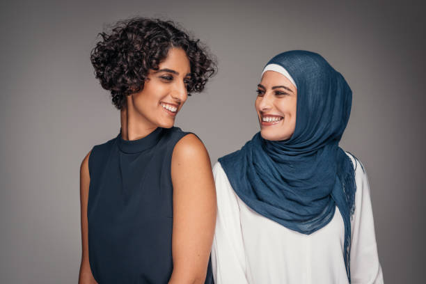 portrait of two beautiful women from middle east who live and work in australia - version 2 imagens e fotografias de stock