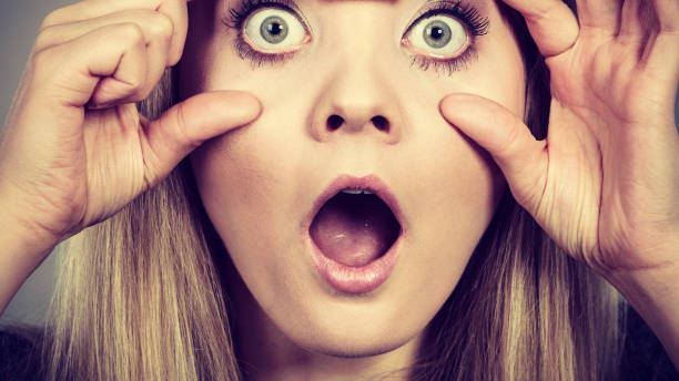 istock Woman having weirdly wide open eyes 899720274