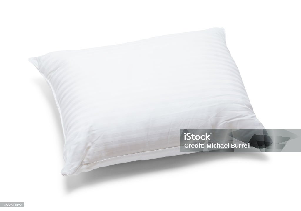 Bed Pillow White Fluffy Bed Pillow Isolated on White Background. Pillow Stock Photo