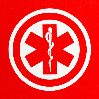 Red Health Care Caduceus Symbol in Circle.