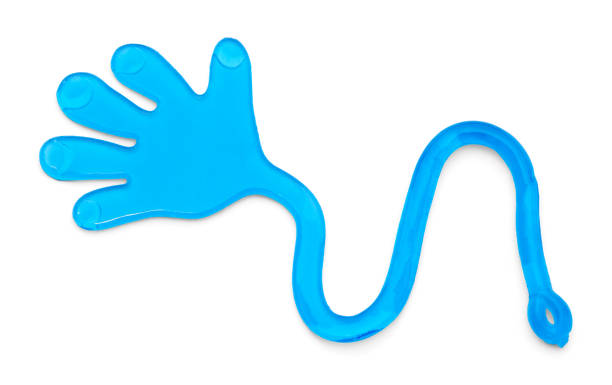 Slappy Hand Blue Sticky Slappy Hand Toy Isolated on White Background. sticky stock pictures, royalty-free photos & images