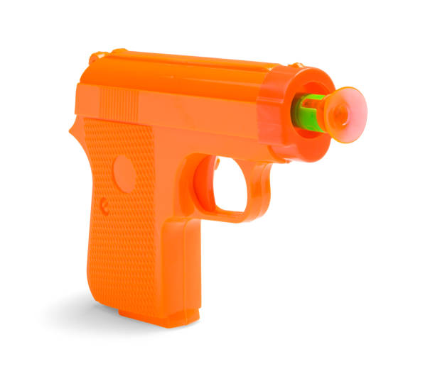 pistola de dardos pegajosos - rubber dart fotografías e imágenes de stock
