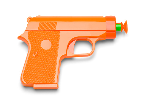 Orange Plastic Toy Dart Gun Isolated on White Background.