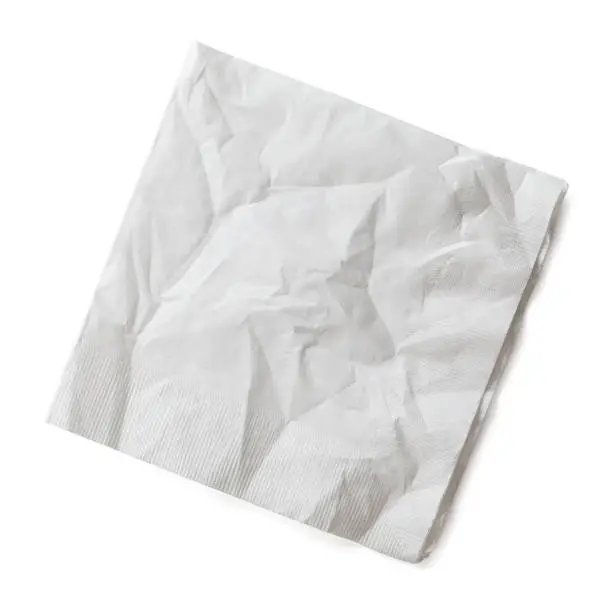 Wrinkled Cocktail Napkin Isolated on White Background.