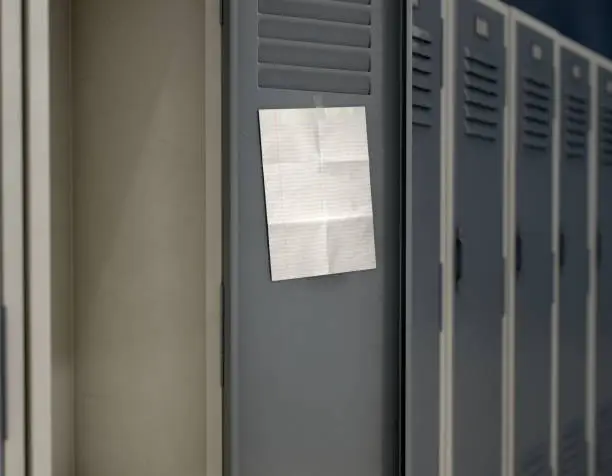 Photo of School Locker With Blank Note.