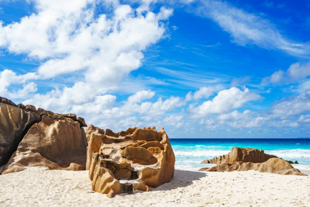 istock granite rocks on seychelles beach, small cove, dike 2 899747348