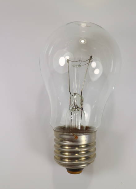 istock 40-watt incandescent lamp on white background 899751396