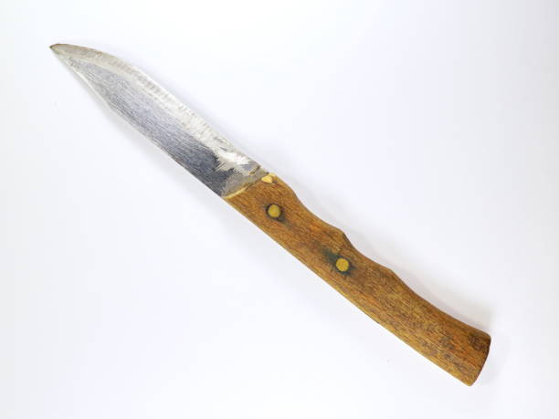 istock table knife with a wooden handle on a white background 899754480