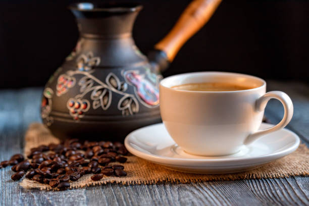 istock Cozy winter setting with cup of coffee and cezva 899757568