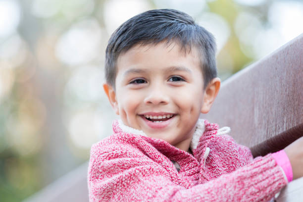 portrait of adorable mixed race boy - dimple imagens e fotografias de stock