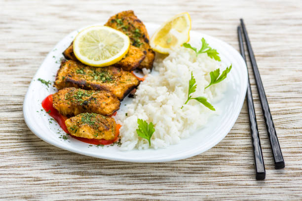 Fish in herbs seasoned with rice. Served on vegetables