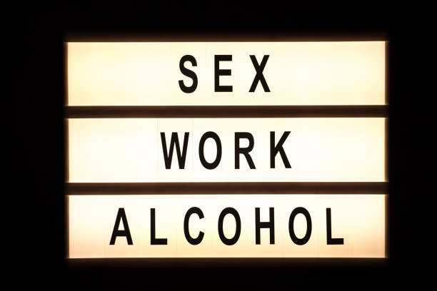 istock Sex, work, alcohol hanging light box 899769056