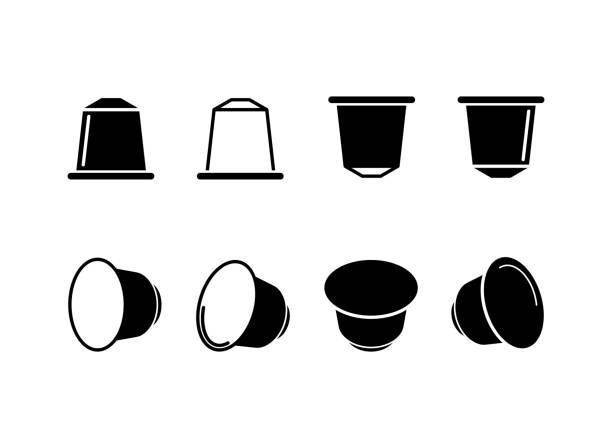 illustrazioni stock, clip art, cartoni animati e icone di tendenza di icona capsula caffè - capsule caffè