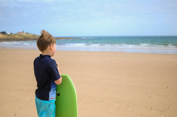 istock Young Children at Australian Beach 899780326