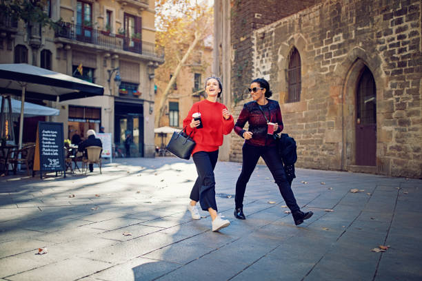 istock Best girlfriends are walking and exploring the gothic quarther 899780562