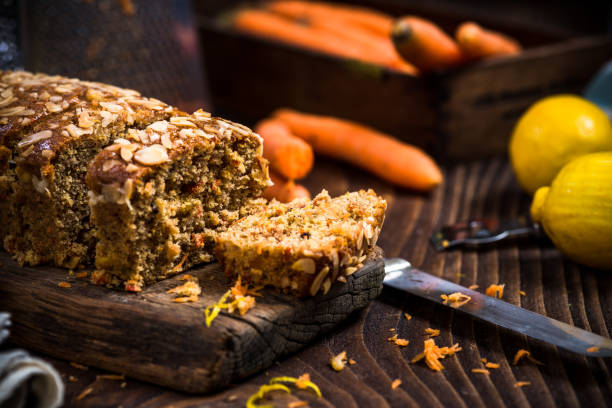 istock Carrot cake sliced on wooden rustic board 899783352