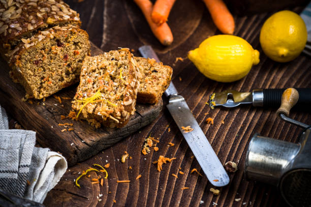 istock Carrot cake sliced on wooden rustic board 899783546