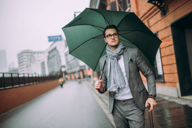 istock Travel man walking with suitcase 899797552
