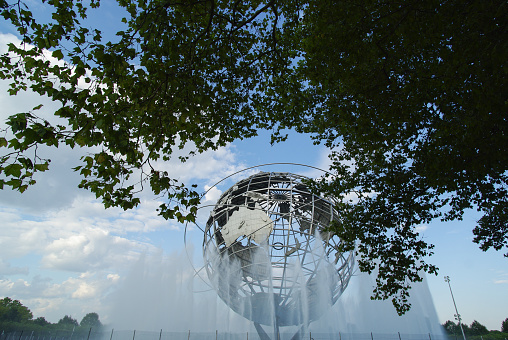 New York City, USA - July 31, 2010: The Unisphere in Fushing Meadows Corona Park, Queens at New York City. The Unisphere is a 12 foot tall, steel representation of the Earth; designed by landscape architect Gilmore D. Clark, the structure was donated by U.S Steel for inclusion in the 1964/1965 New York World's Fair.