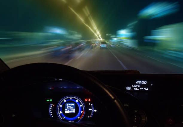 istock car moving on highway at night 899819552