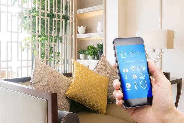 istock smart phone with smart home with modern living room 899823976