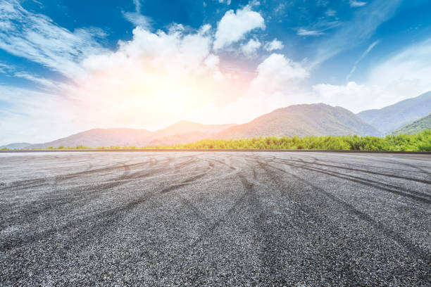 istock square road and mountain nature landscape in summer 899824590