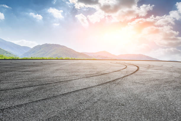 istock square road and mountain nature landscape in summer 899824754