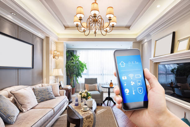 istock smart phone with smart home and modern living room 899827794