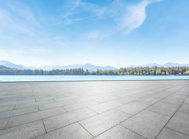 istock empty square and lake with hills landscape in the park 899831568