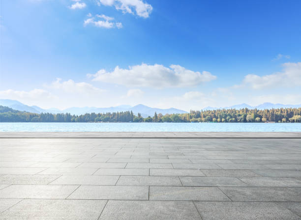istock empty square and lake with hills landscape in the park 899831622