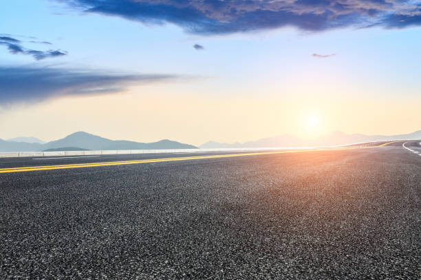 istock country road and hills landscape at sunset 899832242
