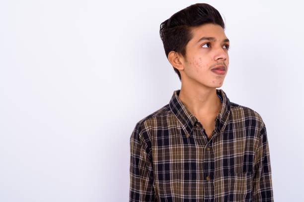 Portrait Of Indian Teenage Boy Against White Background Stock Photo - Download Image Now - iStock Portrait Of Indian Teenage Boy Against White Background Stock Photo - Download Image Now - iStock