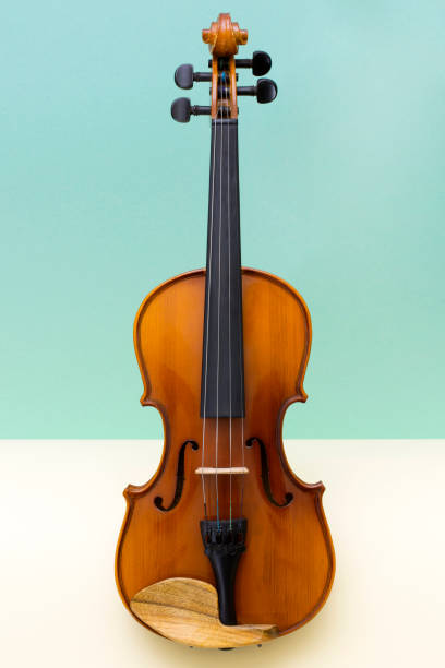 istock Musical instrument violin on a colored background 899852924