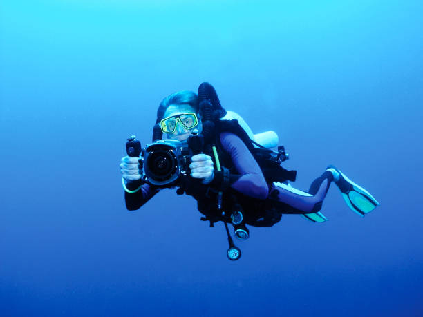 Suspended in the blue diving and filming using a Drager Dolphin semi enclosed rebreather. Taken in the Red Sea.