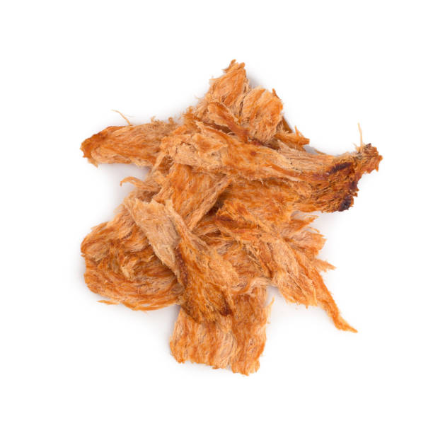 istock Pounded pork jerky, Dry pork pounding with meat tenderizer isolated on a white background 899869172