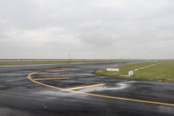 istock empty airport runway on cloudy day 899869686