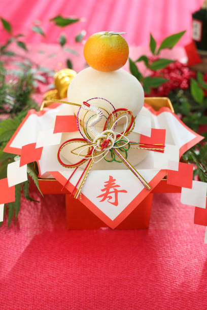 istock Kagami-mochi (a round rice-cake and a bitter orange offered to a deity) 899869760