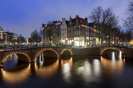 Amsterdam canal bridge at night, The Netherlands