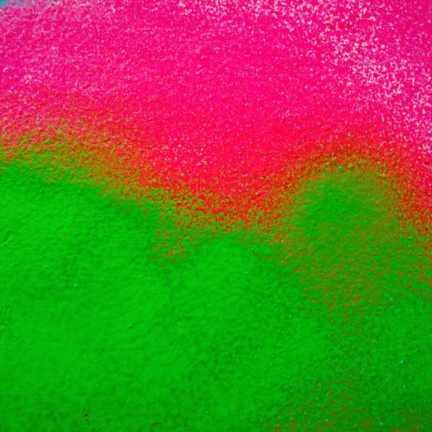 istock Green and Pink Spray Painted Wall 899873842