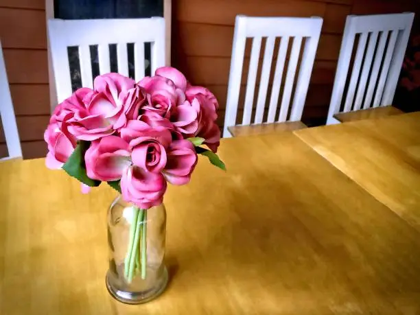 Pink Flowers in Transparent Bottle Vase