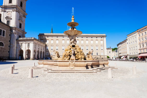 Residenzbrunnen fountain and Residenz Palace on Residenzplatz square in Salzburg, Austria. Residenzplatz is one of the most popular places in Salzburg.