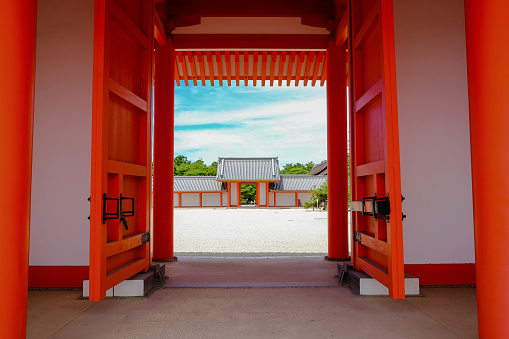 Kyoto, Kansai, Japan - August 10, 2016: Kyoto Imperial Palace has a really bright red color during a sunny day.