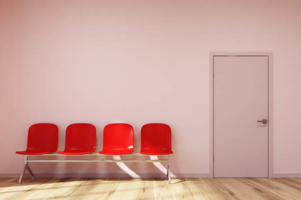 istock Pink waiting room, red chairs 899894268