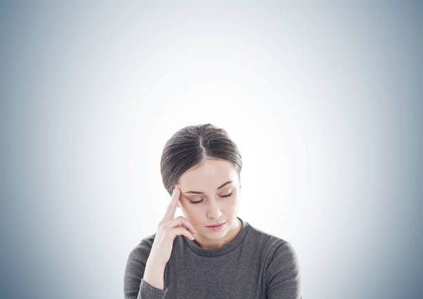 istock Stressed young woman in brown, gray 899895042