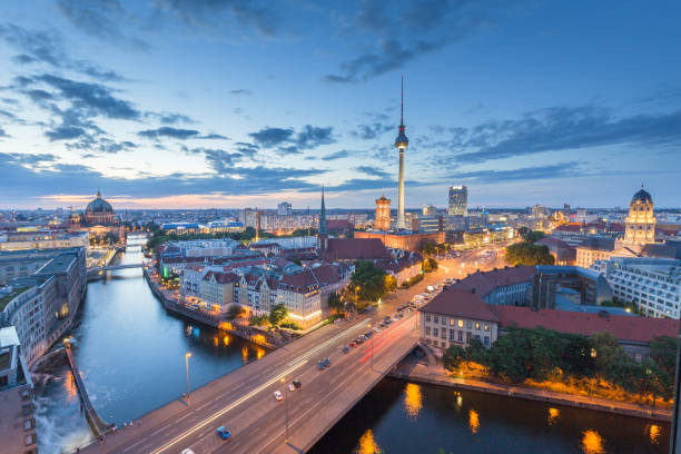 istock Berlin skyline with Spree river at night, Germany 899897386