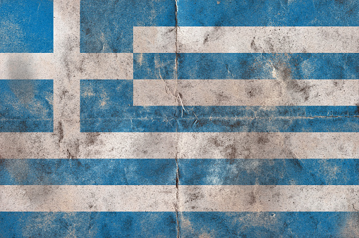 Flag of Greecel on a vintage folded sheet of paper