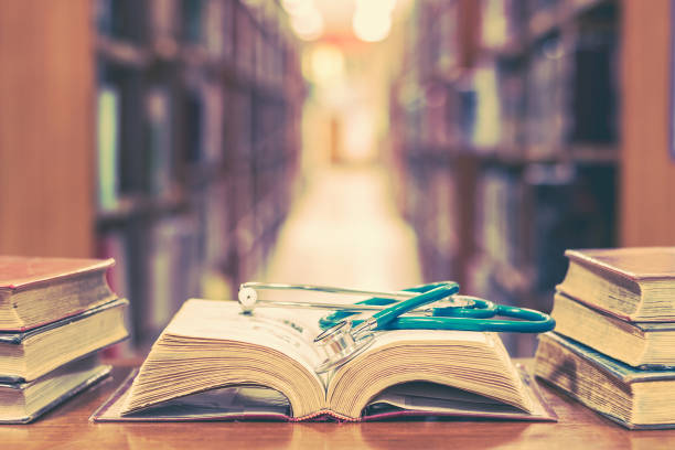 Medical library concept with stethoscope on book