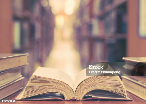 Education Concept With Old Book In Library Stock Photo - Download Image Now - Philosophy, Dictionary, Learning